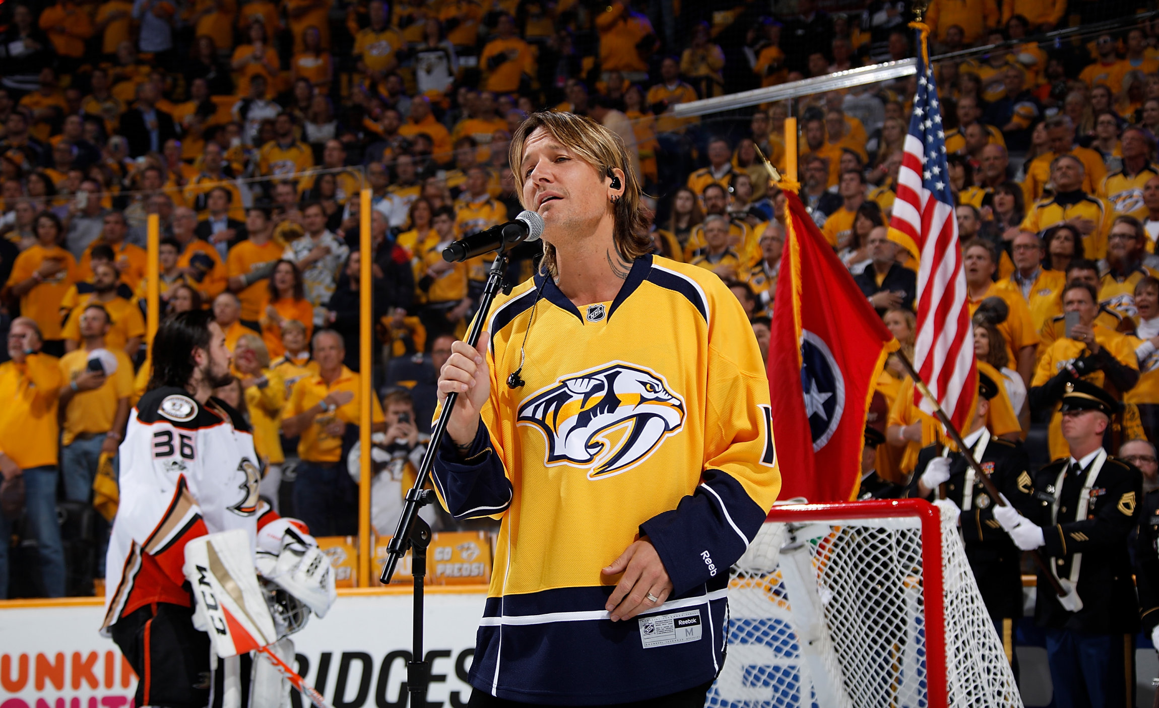 NASHVILLE, TN - MAY 16: Country music artist Keith Urban sings the National Anthem prior to Game Three of the Western Conference Final between the Nashville Predators and Anaheim Ducks during the 2017 NHL Stanley Cup Playoffs at Bridgestone Arena on May 16, 2017 in Nashville, Tennessee. (Photo by John Russell/NHLI via Getty Images)