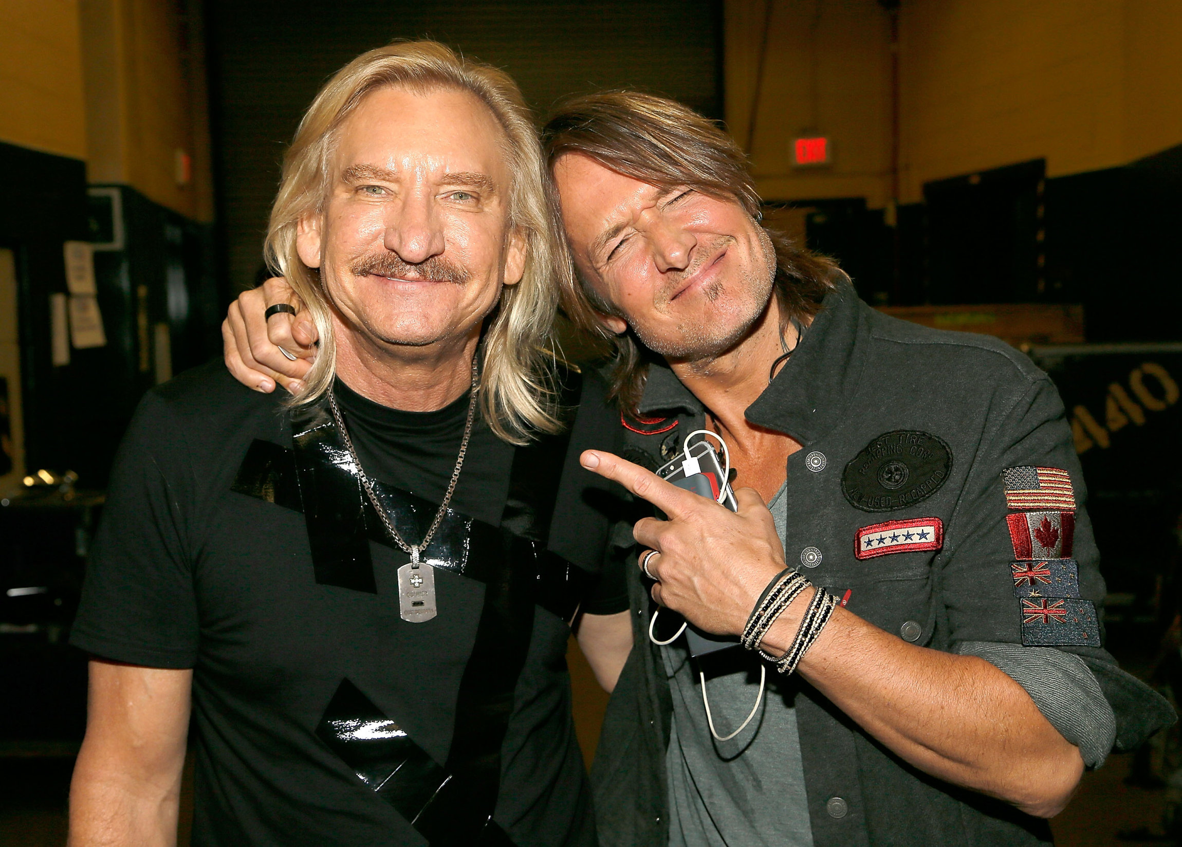 FAIRFAX, VA - SEPTEMBER 20: (EXCLUSIVE COVERAGE) Joe Walsh (L) and Keith Urban backstage the VetsAid Charity Benefit Concert at Eagle Bank Arena on September 20, 2017 in Fairfax, Virginia. VetsAid is a foundation created by Walsh to support veterans and their families. (Photo by Paul Morigi/Getty Images)