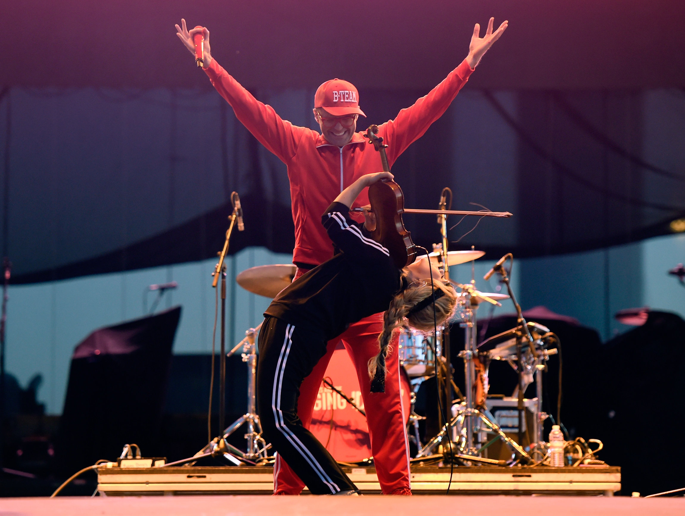 LAS VEGAS, NV - SEPTEMBER 30: Bobby Bones and violinist Natalie Stovall of Bobby Bones and the Raging Idiots perform during the Route 91 Harvest country music festival at the Las Vegas Village on September 30, 2017 in Las Vegas, Nevada. (Photo by David Becker/Getty Images)