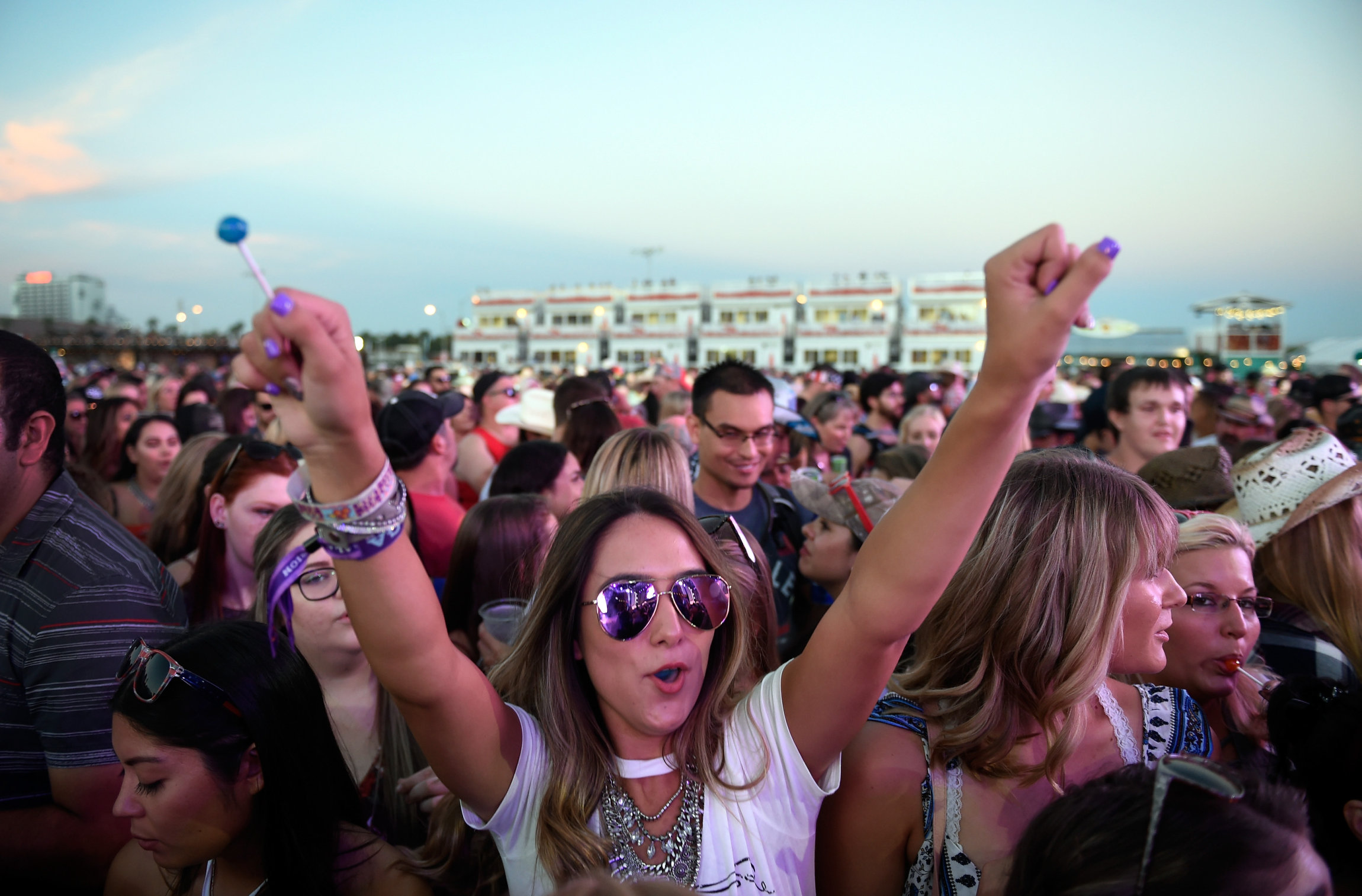 LAS VEGAS, NV - SEPTEMBER 30: Fans cheers during the Route 91 Harvest country music festival at the Las Vegas Village on September 30, 2017 in Las Vegas, Nevada. (Photo by David Becker/Getty Images)