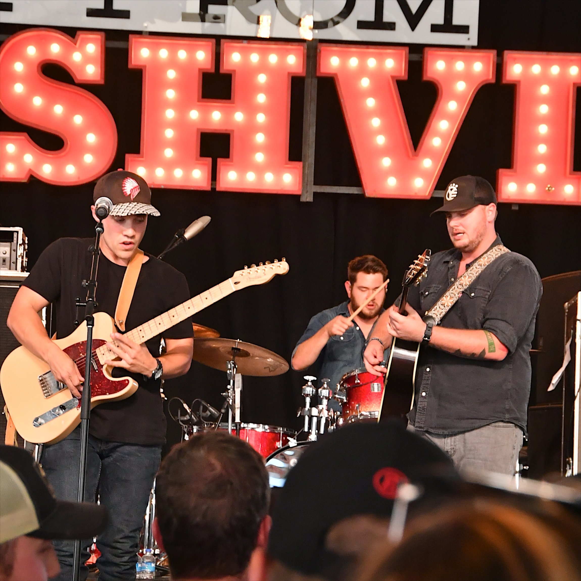 LAS VEGAS, NV - OCTOBER 01: Recording artists Gary Stanton (L) and Charlie Muncaster of Muscadine Bloodline perform during the Route 91 Harvest country music festival at the Las Vegas Village on October 1, 2017 in Las Vegas, Nevada. (Photo by Mindy Small/FilmMagic)