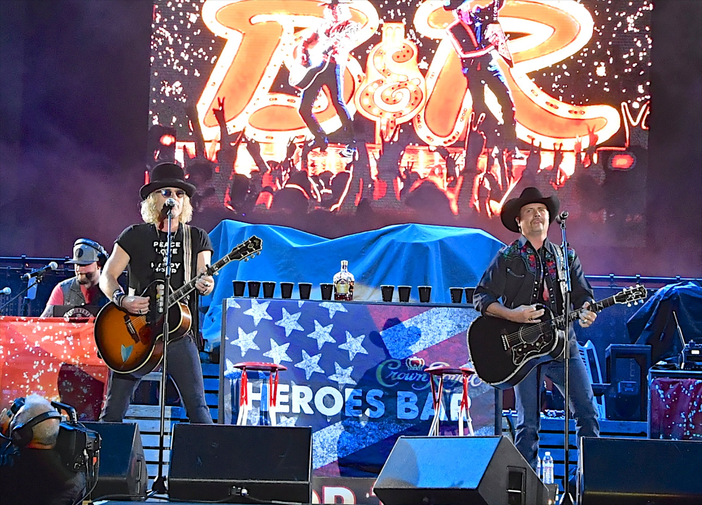 LAS VEGAS, NV - OCTOBER 01: Recording artists Big Kenny (L) and John Rich of Big & Rich perform during the Route 91 Harvest country music festival at the Las Vegas Village on October 1, 2017 in Las Vegas, Nevada. (Photo by Mindy Small/FilmMagic)