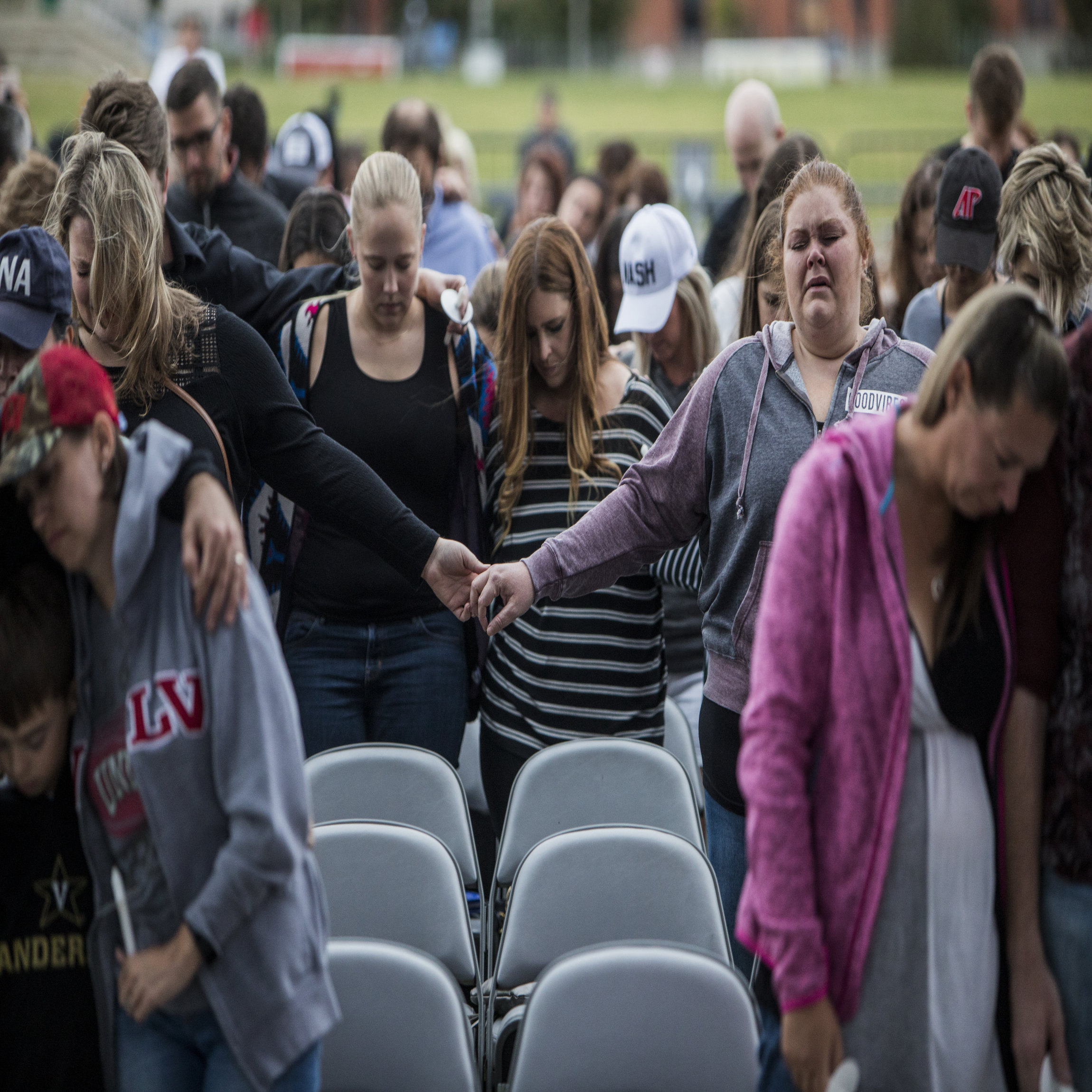 NASHVILLE, TN - OCTOBER 02: People gather at the Ascend Amphitheater for a vigil honoring the victims of the mass shooting in Las Vegas on October 2, 2017 in Nashville, Tennessee. At least 58 people were killed and 500 wounded at the Route 91 Harvest Festival in Las Vegas Sunday night. (Photo by Joe Buglewicz/Getty Images)