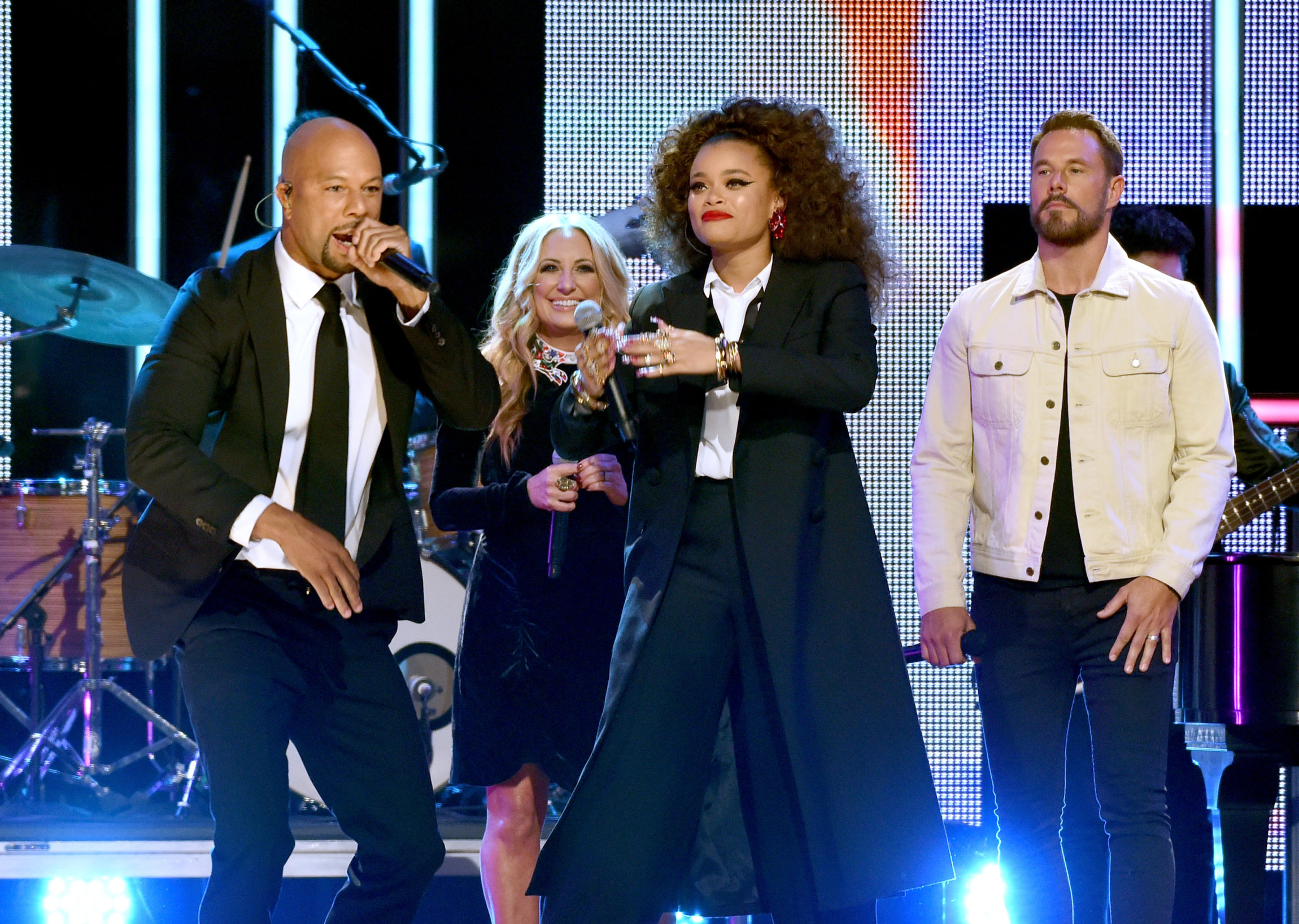 NASHVILLE, TN - OCTOBER 18: (L-R) Singer-songwriters Common, Lee Ann Womack, Andra Day and Jimi Westbrook of Little Big Town perform onstage at the 2017 CMT Artists Of The Year on October 18, 2017 in Nashville, Tennessee. (Photo by Rick Diamond/Getty Images for CMT)