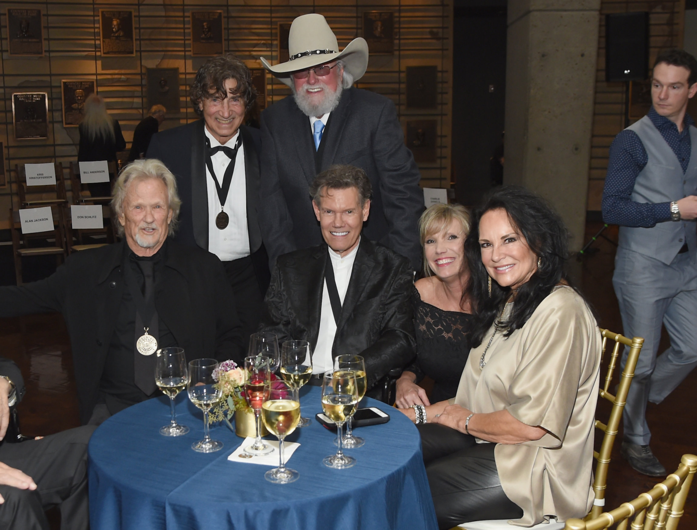 NASHVILLE, TN - OCTOBER 22: Kris Kristofferson, Richard Sterban, Charlie Daniels, Randy Travis, Donna Sterban, and Mary Davis attend the Medallion Ceremony to celebrate 2017 hall of fame inductees Alan Jackson, Jerry Reed And Don Schlitz at Country Music Hall of Fame and Museum on October 22, 2017 in Nashville, Tennessee. (Photo by Rick Diamond/Getty Images for Country Music Hall Of Fame & Museum)