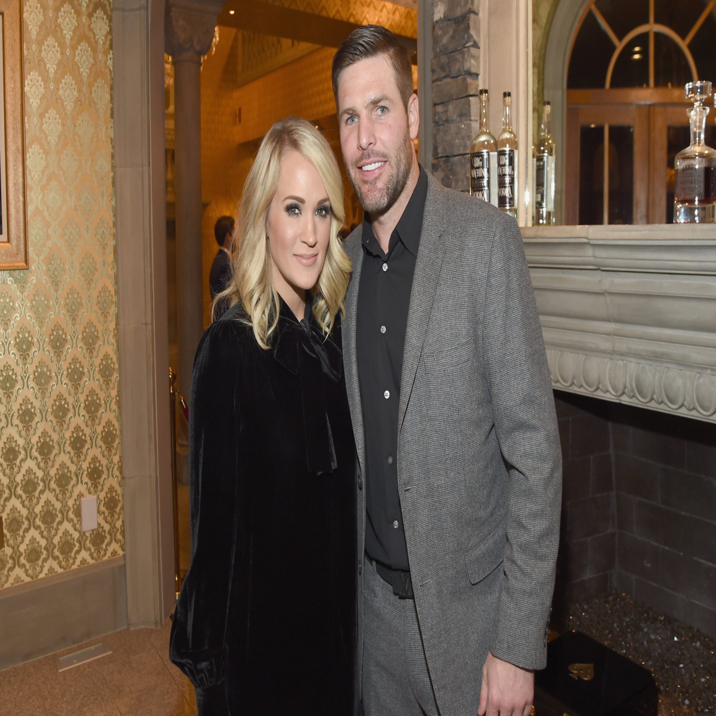 BRENTWOOD, TN - OCTOBER 24: Singer-songwriter Carrie Underwood (L) and NHL Player Mike Fisher (R) attend Nashville Shines for Haiti benefiting Sean Penn's J/P Haitian relief organization featuring Tim McGraw hosted and underwritten by Johnathon Arndt and Newman Arndt at the Arndt Estate on October 24, 2017 in Brentwood, Tennessee. (Photo by Rick Diamond/Getty Images for J/P Haitian Relief Organization)