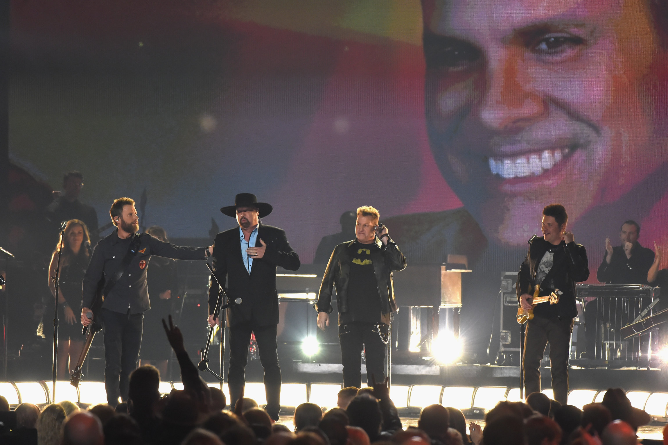 NASHVILLE, TN - NOVEMBER 08: Dierks Bentley, Eddie Montgomery, Gary LeVox, and Jay DeMarcus perform onstage at the 51st annual CMA Awards at the Bridgestone Arena on November 8, 2017 in Nashville, Tennessee. (Photo by Rick Diamond/Getty Images)