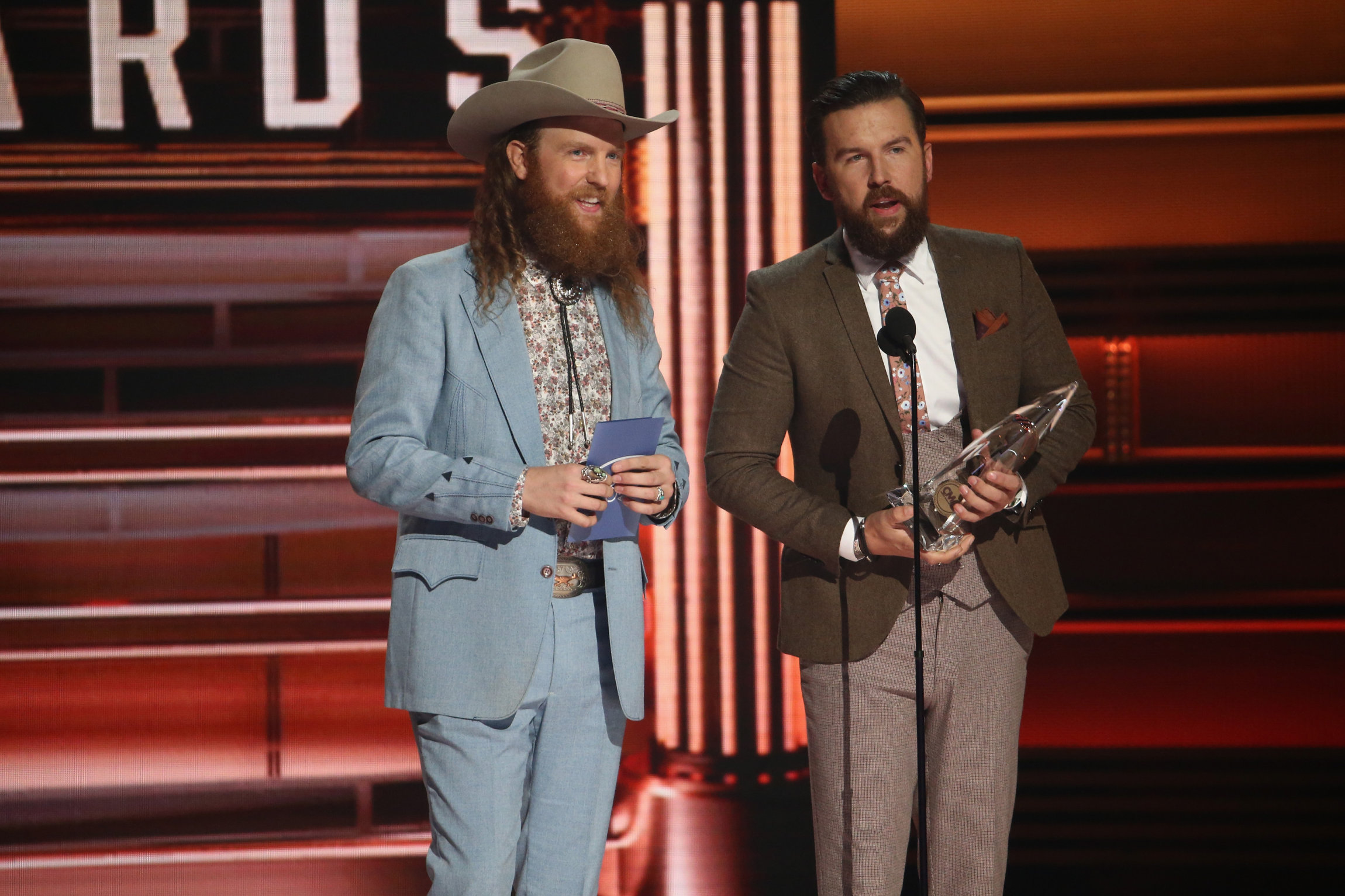 NASHVILLE, TN - NOVEMBER 08: John Osborne and T.J. Osborne of Brothers Osborne accept an award onstage at the 51st annual CMA Awards at the Bridgestone Arena on November 8, 2017 in Nashville, Tennessee. (Photo by Terry Wyatt/FilmMagic)