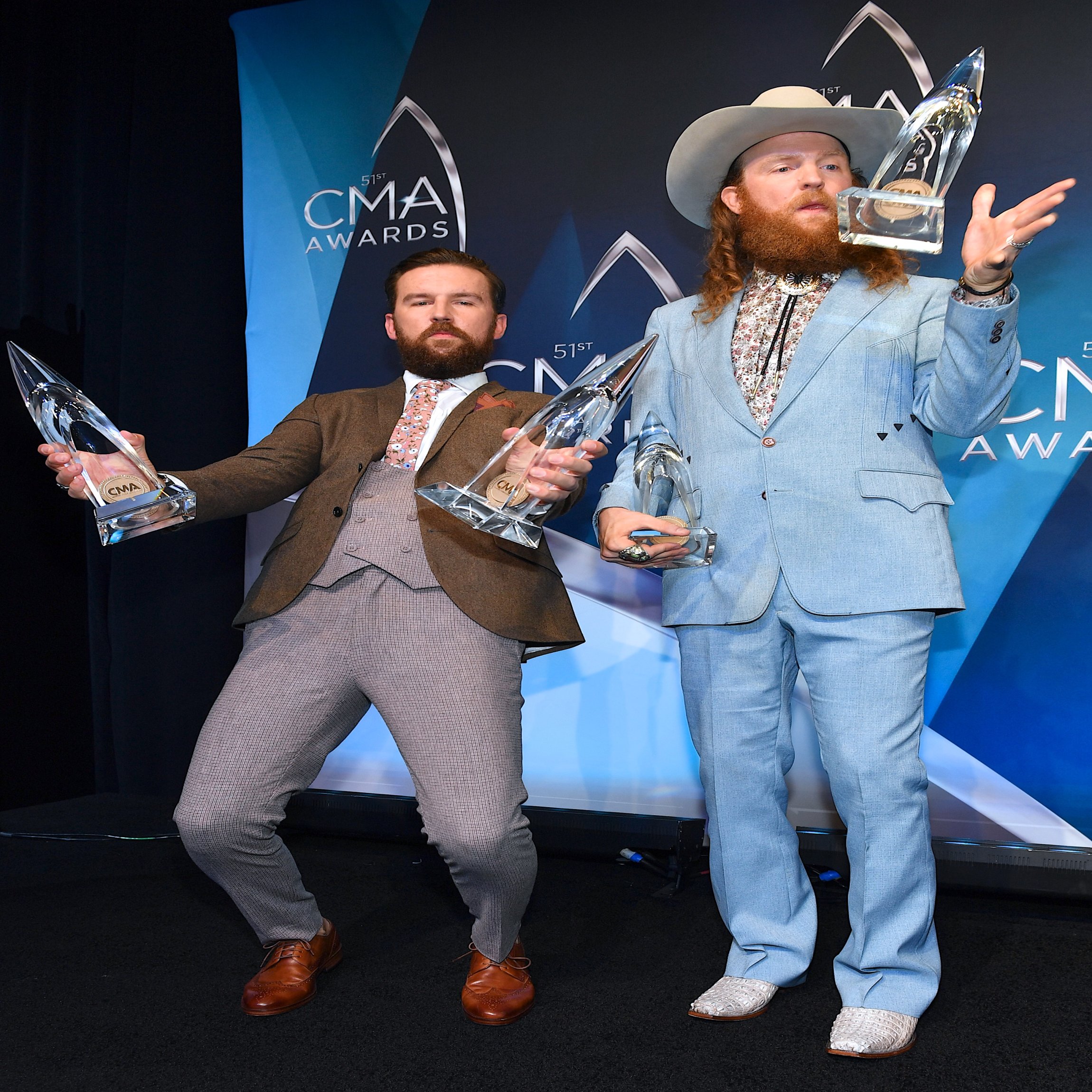 NASHVILLE, TN - NOVEMBER 08: Recording Artists TJ. Osborne and John Osborne of Brothers Osborne celebrate winning Vocal Duo of the year during 51st annual CMA Awards at the Bridgestone Arena on November 8, 2017 in Nashville, Tennessee. (Photo by Jason Davis/FilmMagic)