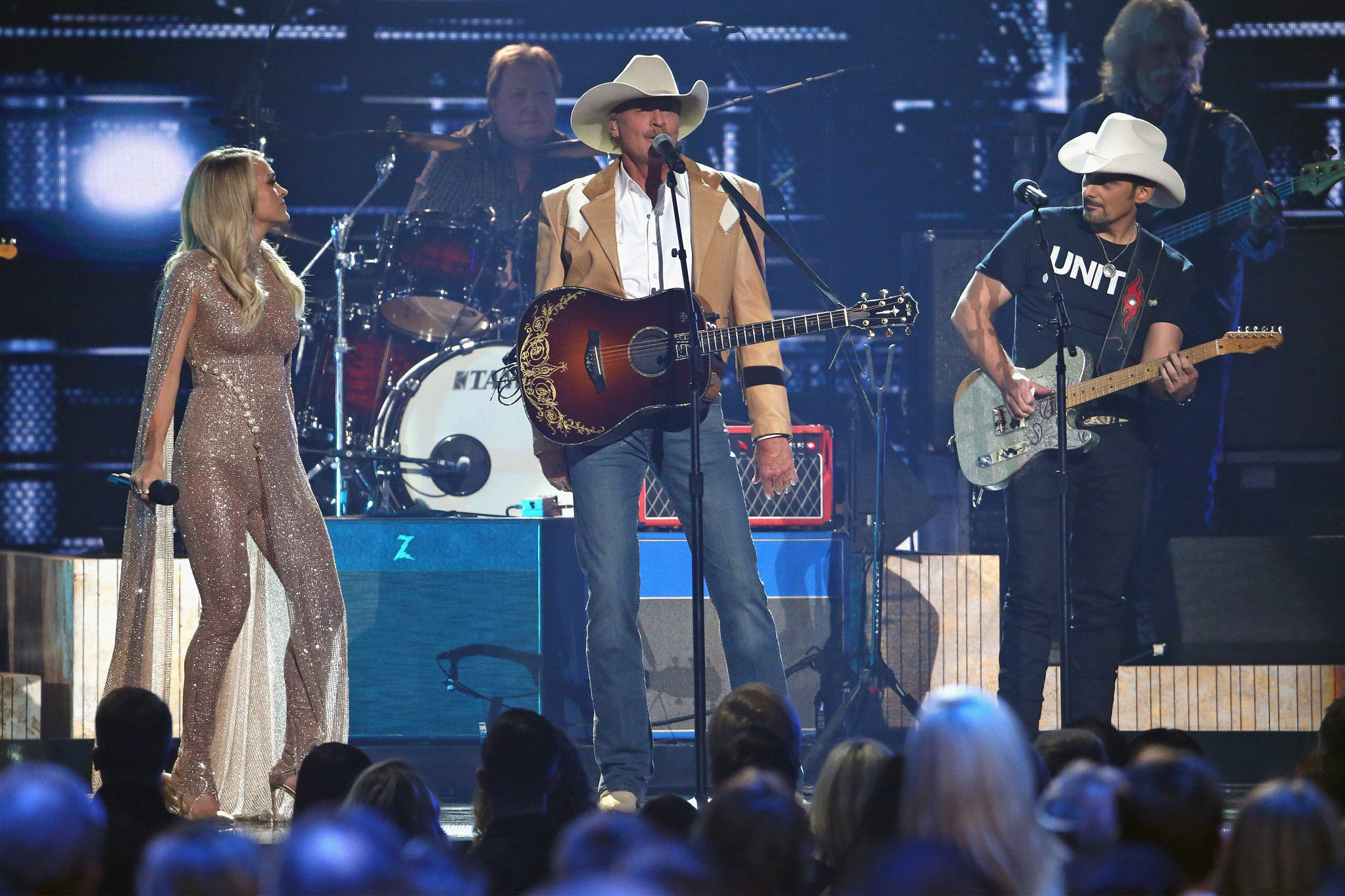 NASHVILLE, TN - NOVEMBER 08: Carrie Underwood, Alan Jackson and Brad Paisley perform onstage during the 51st annual CMA Awards at the Bridgestone Arena on November 8, 2017 in Nashville, Tennessee. (Photo by Terry Wyatt/FilmMagic)