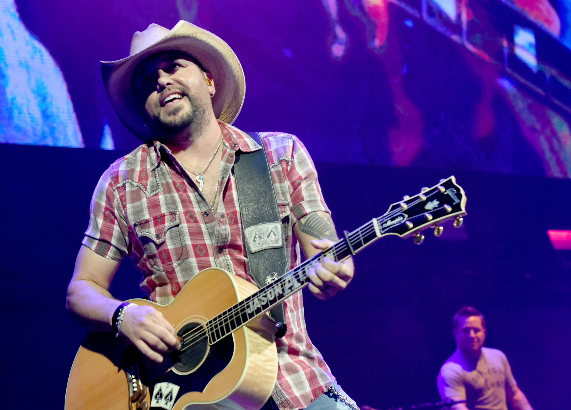 NASHVILLE, TN - NOVEMBER 12: In this handout photo provided by The Country Rising Fund of The Community Foundation of Middle Tennessee, singer Jason Aldean performs onstage for the Country Rising Benefit Concert at Bridgestone Arena on November 12, 2017 in Nashville, Tennessee. (Photo by Rick Diamond/Country Rising/Getty Images)