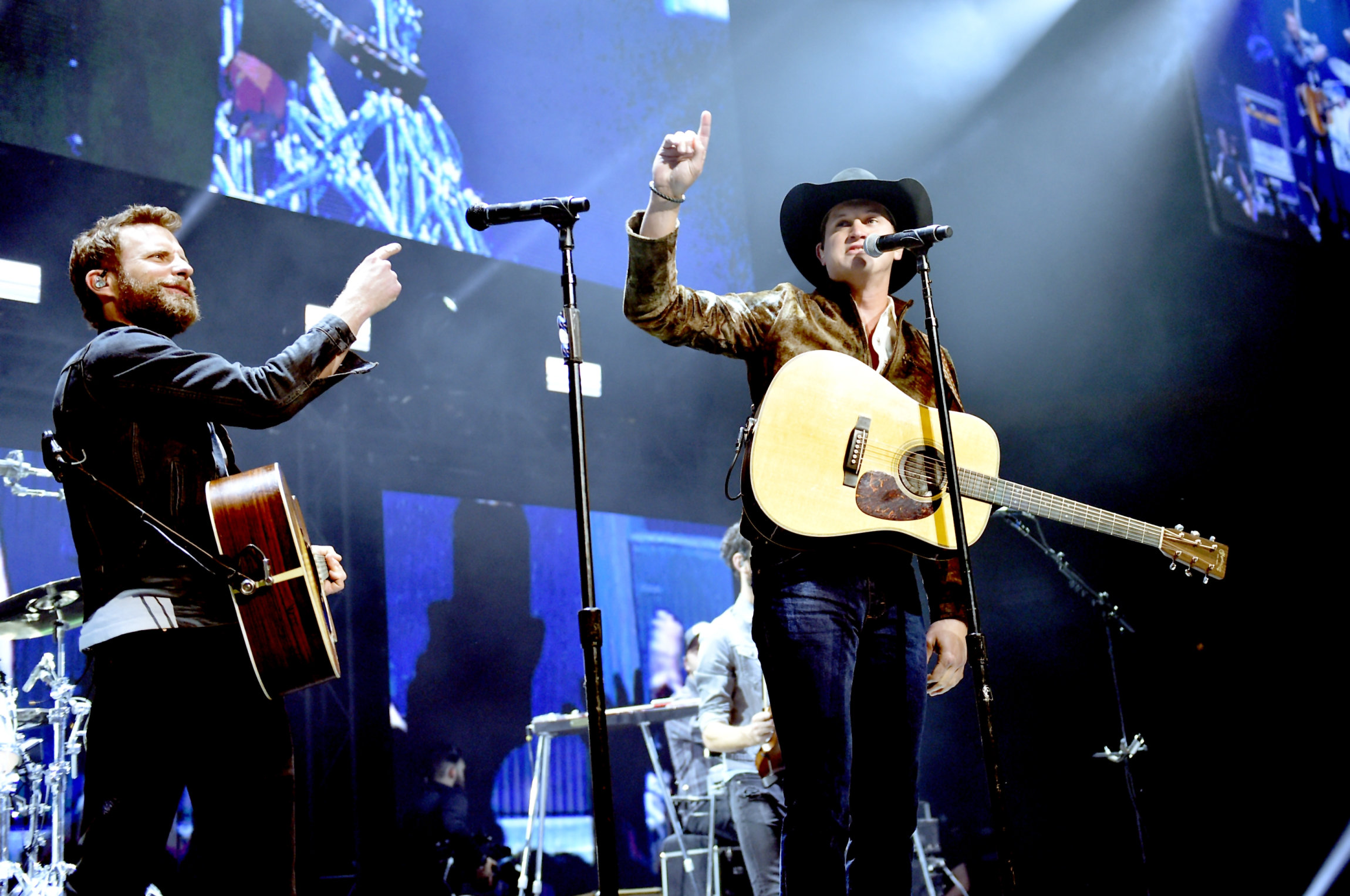 NASHVILLE, TN - NOVEMBER 12: In this handout photo provided by The Country Rising Fund of The Community Foundation of Middle Tennessee, Musical artists Dierks Bentley and Jon Pardi perform onstage for the Country Rising Benefit Concert at Bridgestone Arena on November 12, 2017 in Nashville, Tennessee. (Photo by John Shearer/Country Rising/Getty Images)