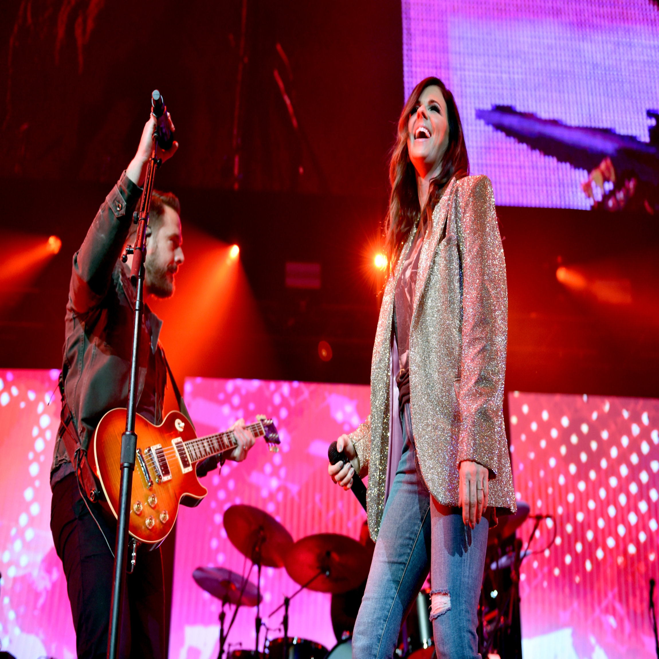 NASHVILLE, TN - NOVEMBER 12: In this handout photo provided by The Country Rising Fund of The Community Foundation of Middle Tennessee, Jimi Westbrook and Karen Fairchild of Little Big Town perform onstage for the Country Rising Benefit Concert at Bridgestone Arena on November 12, 2017 in Nashville, Tennessee. (Photo by John Shearer/Country Rising/Getty Images)