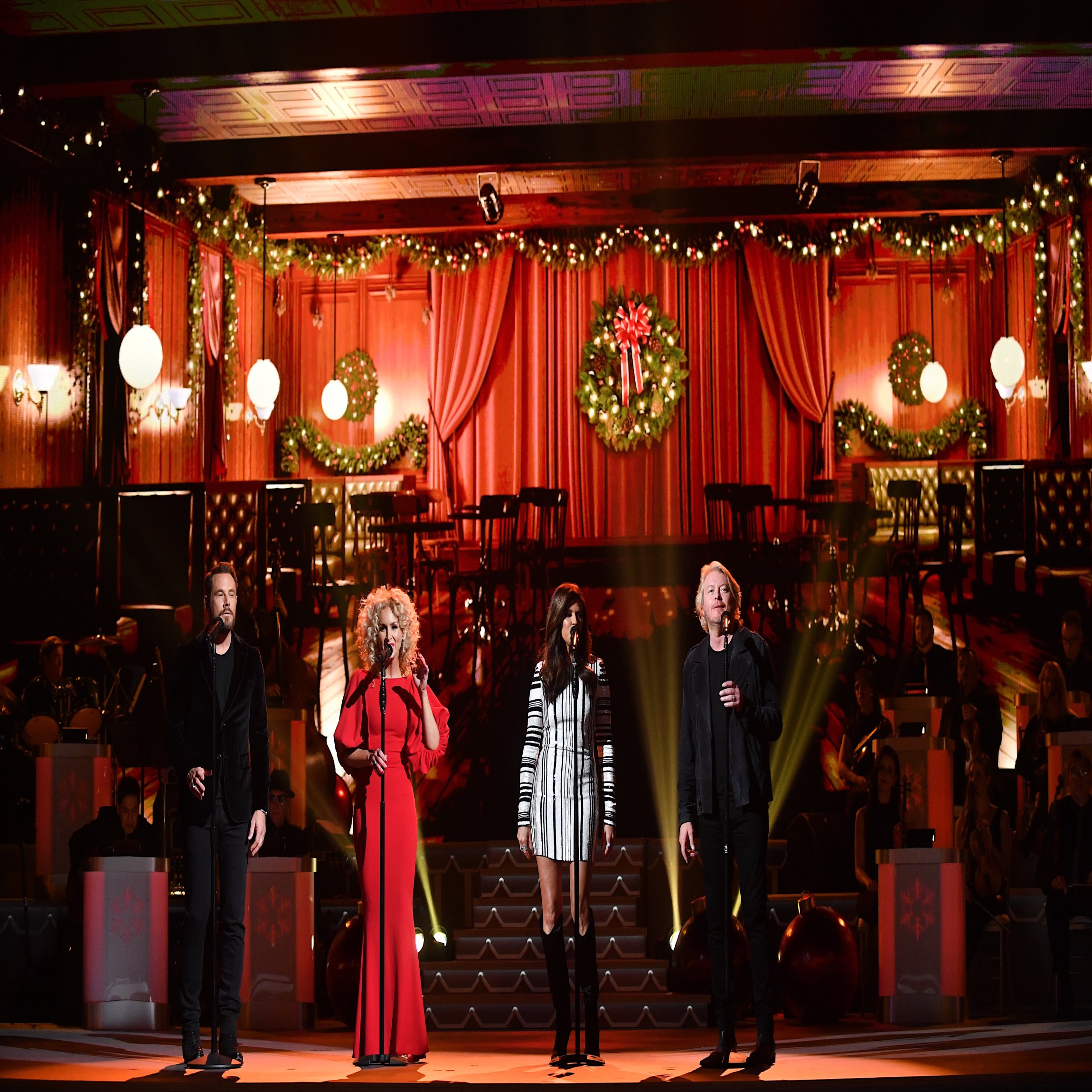 NASHVILLE, TN - NOVEMBER 14: (L-R) Recording Artists Jimi Westbrook, Kimberly Schlapman, Karen Fairchild and Phillip Sweet of Little Big Town perform on stage during the 2017 CMA Country Christmas at The Grand Ole Opry on November 14, 2017 in Nashville, Tennessee. (Photo by Jason Davis/WireImage)