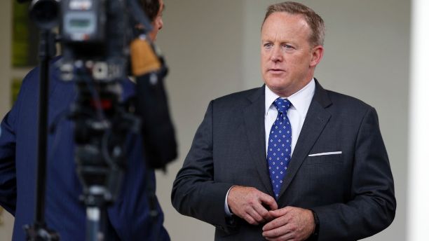 White House press secretary Sean Spicer does a television interview at the White House, Friday, June 23, 2017, in Washington. (AP Photo/Alex Brandon)