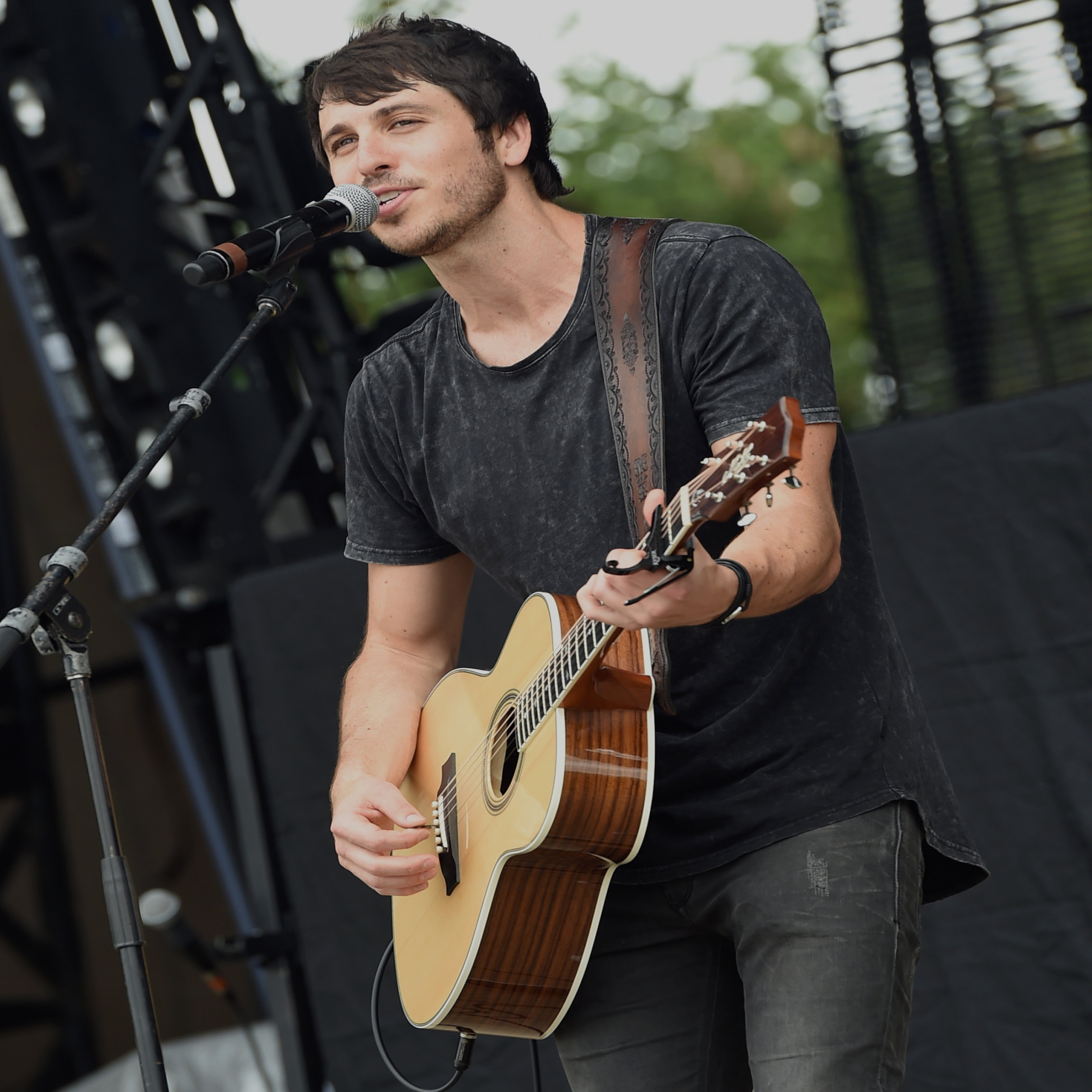 TWIN LAKES, WI - JULY 22: Singer/Songwriter Morgan Evans performs during Country Thunder In Twin Lakes, Wisconsin - Day 3 on July 22, 2017 in Twin Lakes, Wisconsin. (Photo by Rick Diamond/Getty Images for Country Thunder)