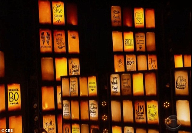 'On October 1, all of country music was reminded in the most tragic way, the connection we share with our fans, and the healing power music will always provide,' Church said. Pictured are the names of some victims from the tragedy