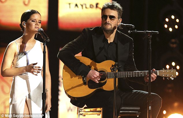 Ahead of their performance, Morris (left) spoke to Rolling Stone. 'We need to protect ourselves and our children, and I want the county music community to get brave and talk about it,' she said. Eric Church is also pictured 