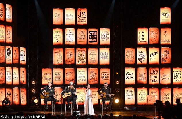 The names of all of the victims were displayed on a backdrop as the singers performed