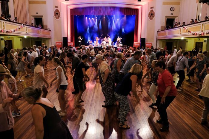 Line dancers on the floor at the Tamworth Country Music Festival 