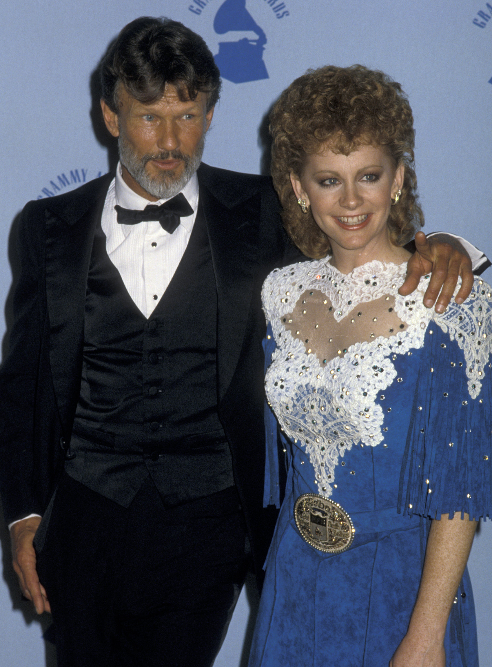 LOS ANGELES, CA - FEBRUARY 25: Kris Kristofferson and Reba McEntire attend 28th Annual Grammy Awards on February 25, 1986 at the Shrine Auditorium in Los Angeles, California. (Photo by Ron Galella, Ltd./WireImage)