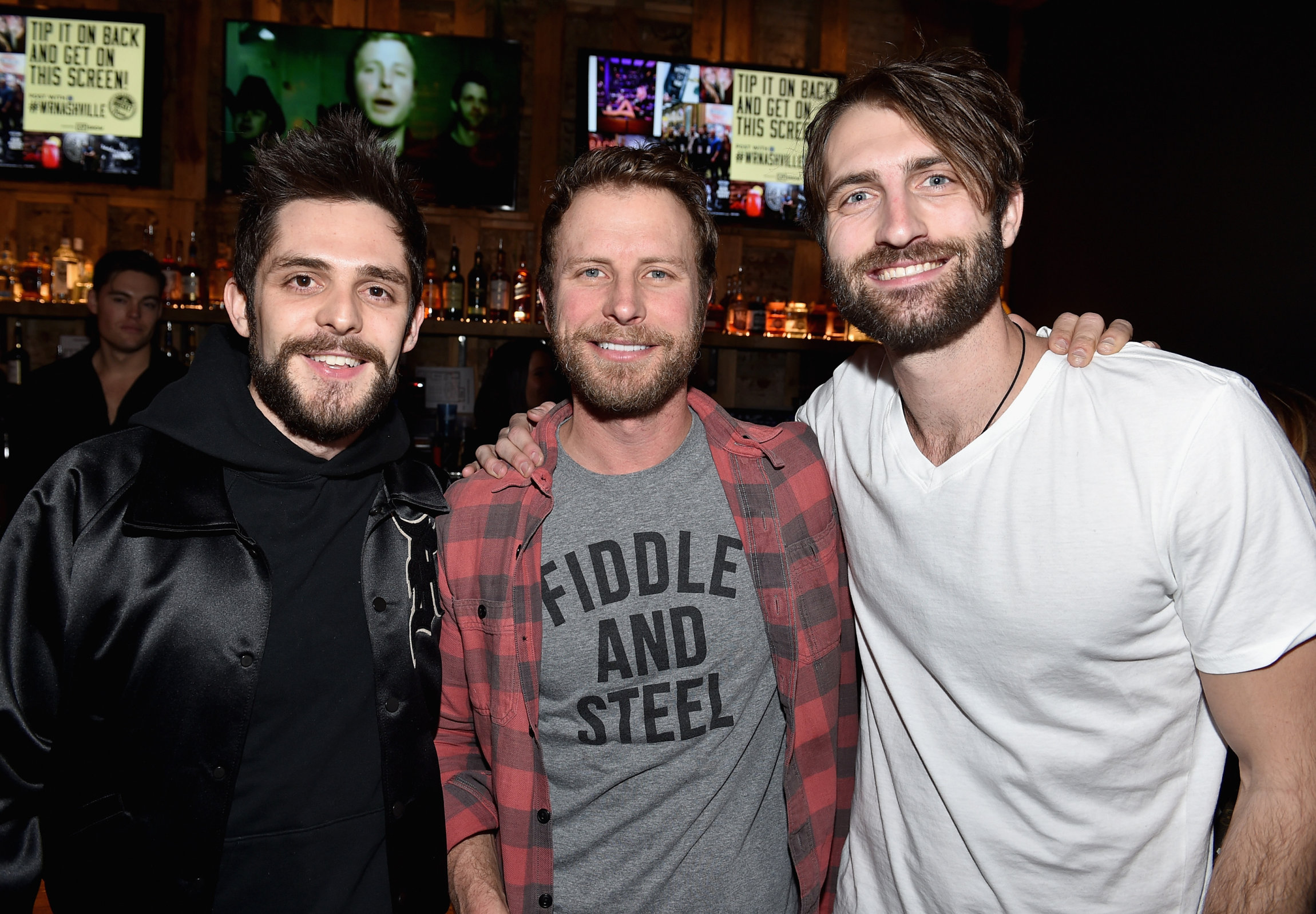 NASHVILLE, TN - JANUARY 14: Thomas Rhett, Dierks Bentley, and Ryan Hurd attend the Nashville Opening of Dierks Bentley's Whiskey Row on January 14, 2018 in Nashville, Tennesse (Photo by John Shearer/Getty Images for Dierks Bentley's Whiskey Row Nashville)