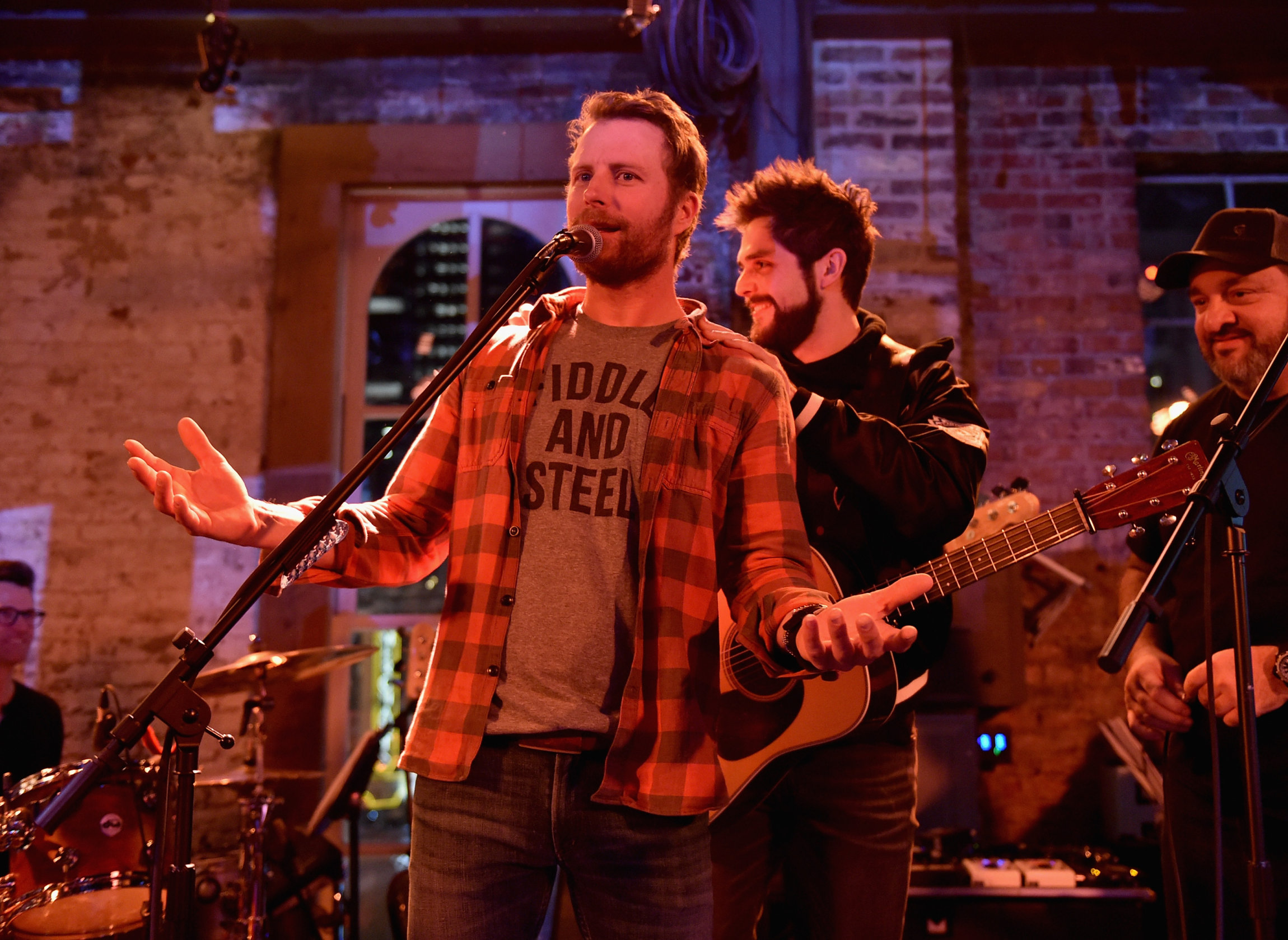 NASHVILLE, TN - JANUARY 14: Dierks Bentley and Thomas Rhett speak onstage during the Nashville Opening of Dierks Bentley's Whiskey Row on January 14, 2018 in Nashville, Tennesse (Photo by John Shearer/Getty Images for Dierks Bentley's Whiskey Row Nashville)