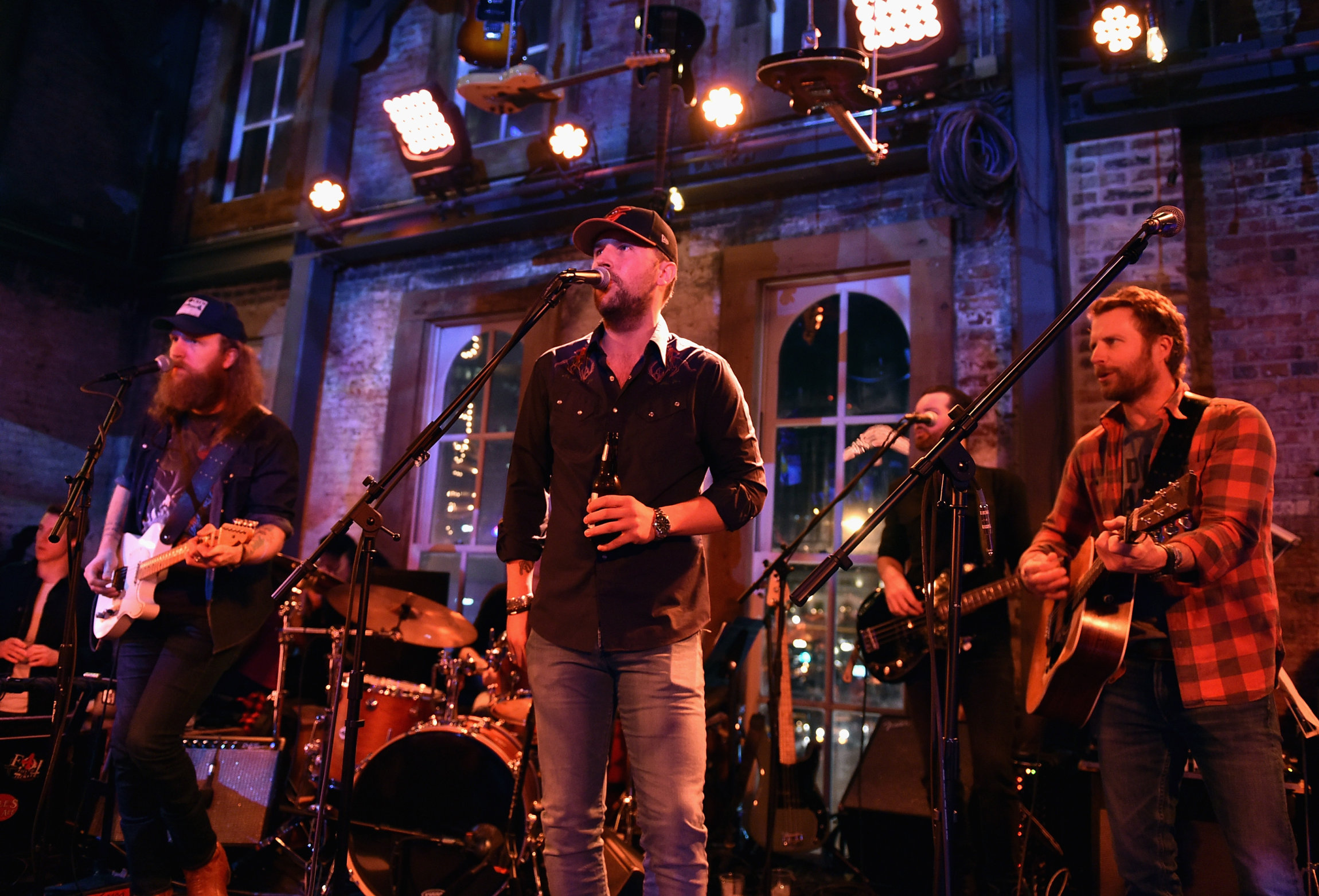 NASHVILLE, TN - JANUARY 14: John Osborne and T.J. Osborne of Brothers Osborne and Dierks Bentley perform onstage during the Nashville Opening of Dierks Bentley's Whiskey Row on January 14, 2018 in Nashville, Tennesse (Photo by John Shearer/Getty Images for Dierks Bentley's Whiskey Row Nashville)