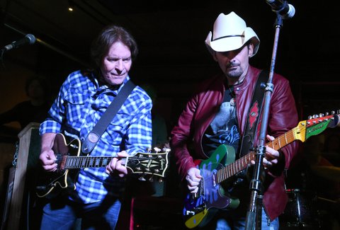 NASHVILLE, TN - APRIL 23: John Fogerty and Brad Paisley perform onstage at Tootsie's Orchid Lounge after the Brad Paisley LOVE AND WAR Album Launch Event on April 23, 2017 in Nashville, Tennessee. (Photo by Rick Diamond/Getty Images for Sony Music)