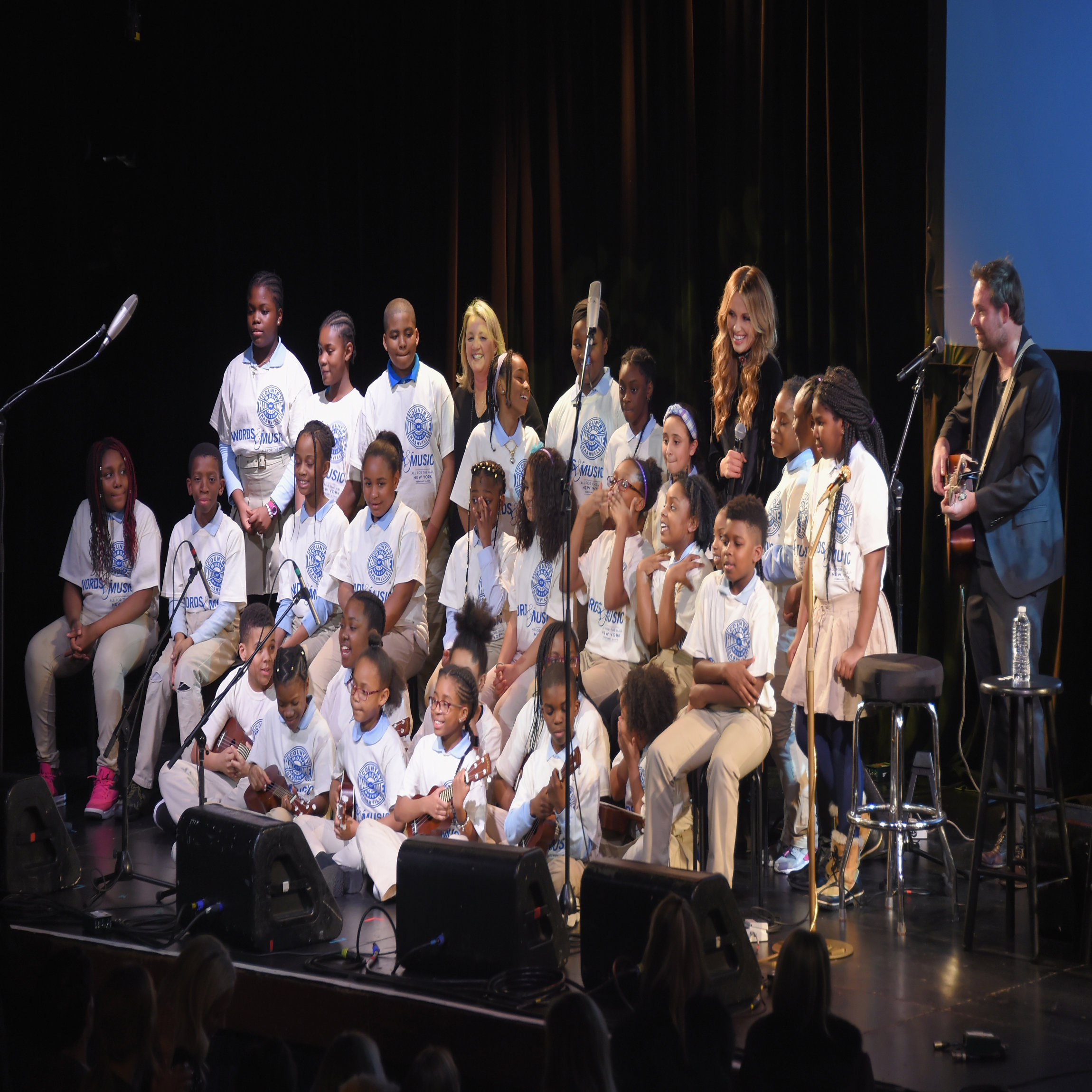 NEW YORK, NY - FEBRUARY 12: Students of P.S.169 Baychester Academy perform with Liz Rose, Carly Pearce and Phil Barton onstage at the Country Music Hall of Fame and Museum's 'All for the Hall' Benefit on February 13, 2018 in New York City. (Photo by Michael Loccisano/Getty Images for Country Music Hall Of Fame)